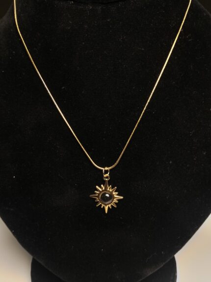 Gold Plated Sunburst Medallion Necklace with Black Gemstone – Cosmic Snake Chain Jewelry