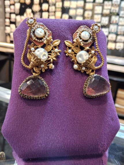 Designer Floral & Pearl Drop Earrings with Triangular Amethyst-Tone Stone and Antique Gold Finish
